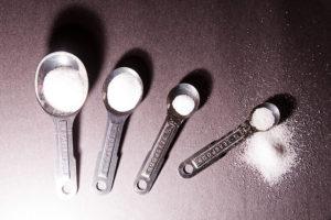measuring spoons of sugar